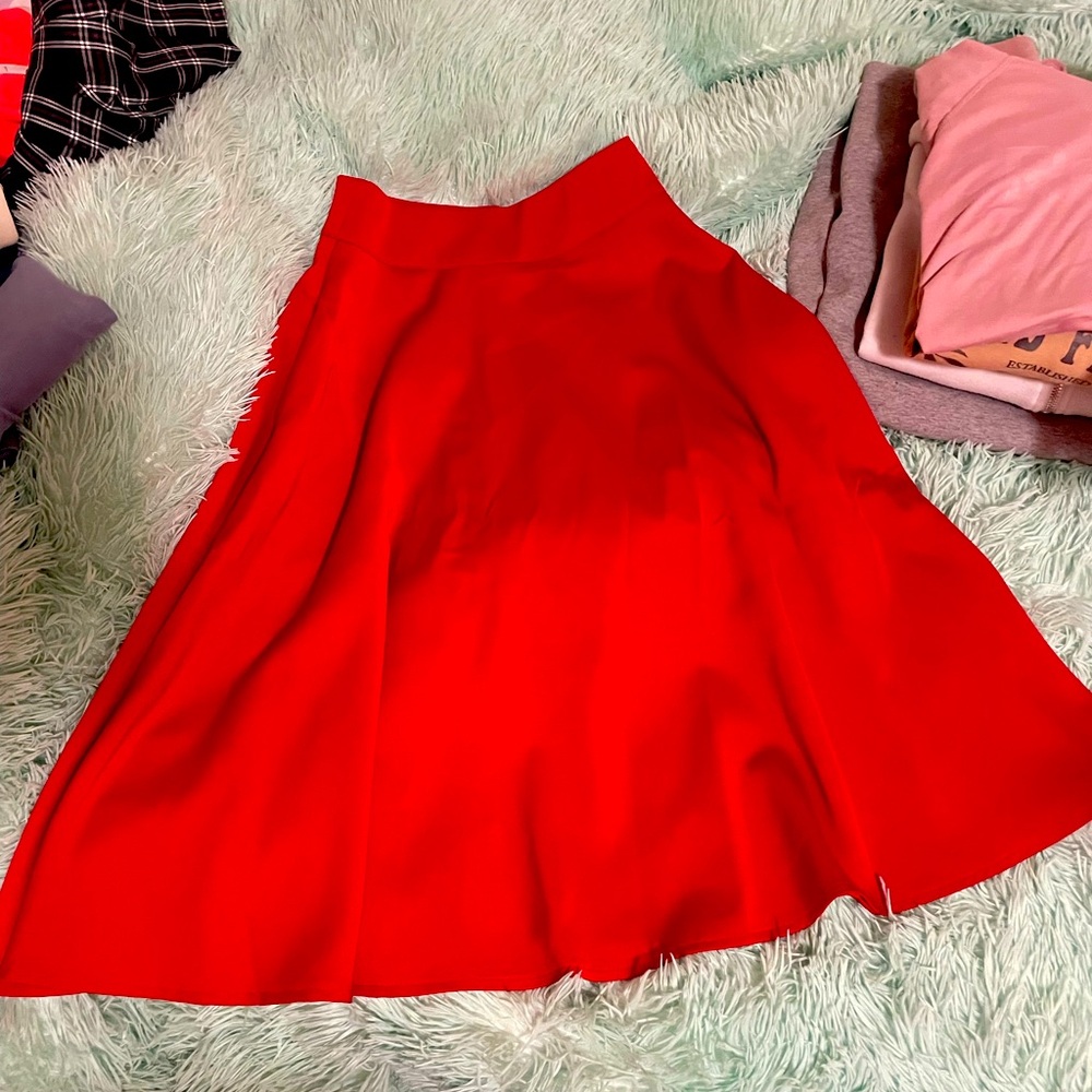 Unique vintage red swing skirt, like new. Figure flattering. Size XS